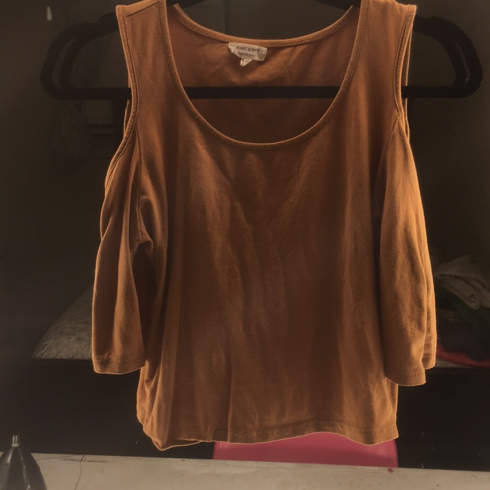 A mustard yellow crop top